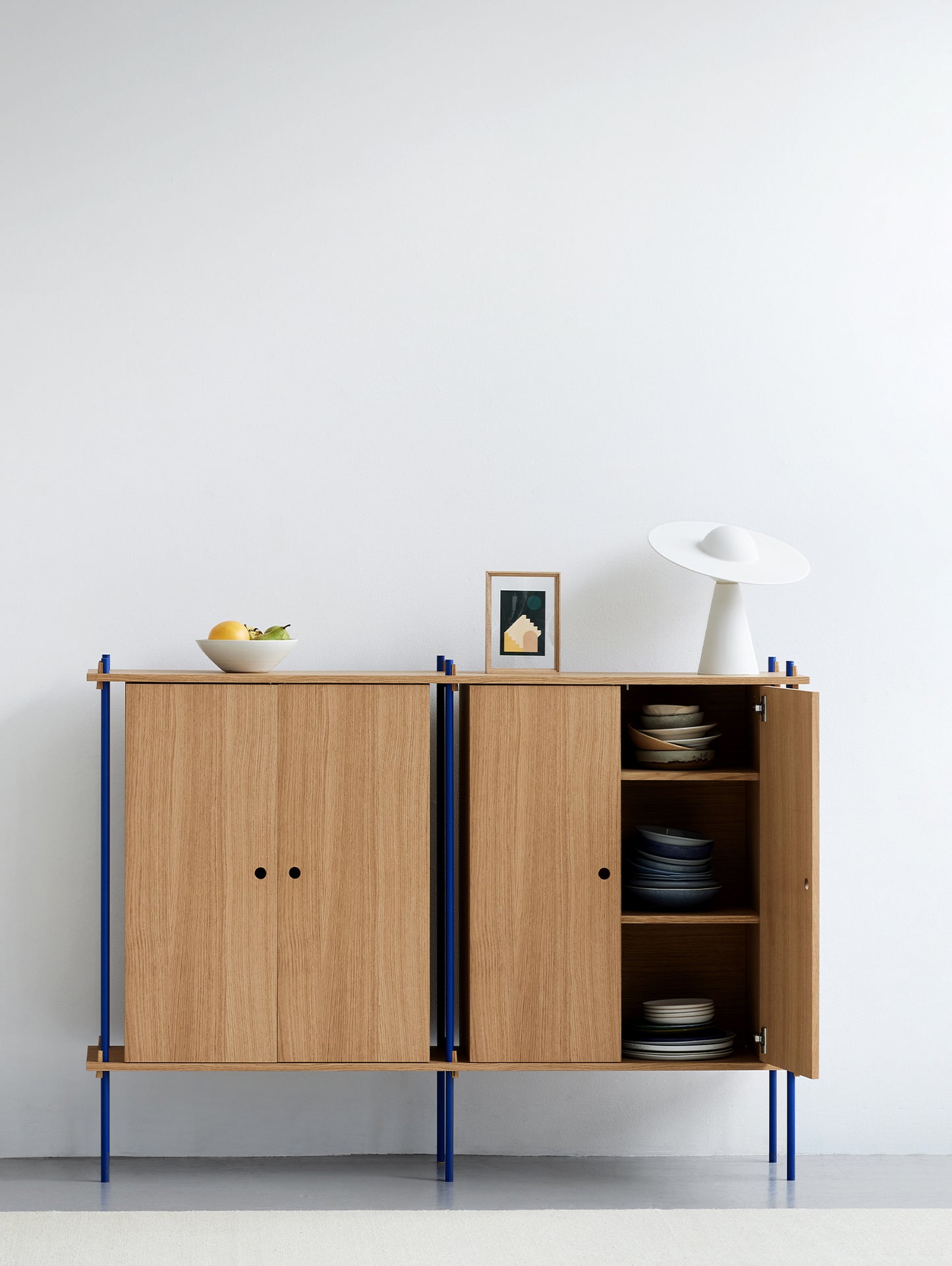 Moebe Shelving System - S.115.2.E Set in Deep Blue / Oiled Oak