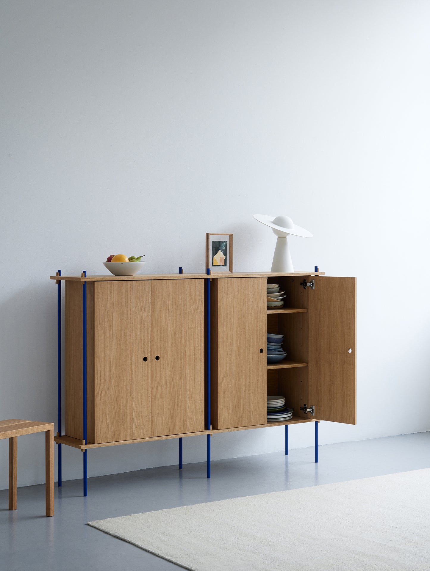 Moebe Shelving System - S.115.2.E Set in Deep Blue / Oiled Oak