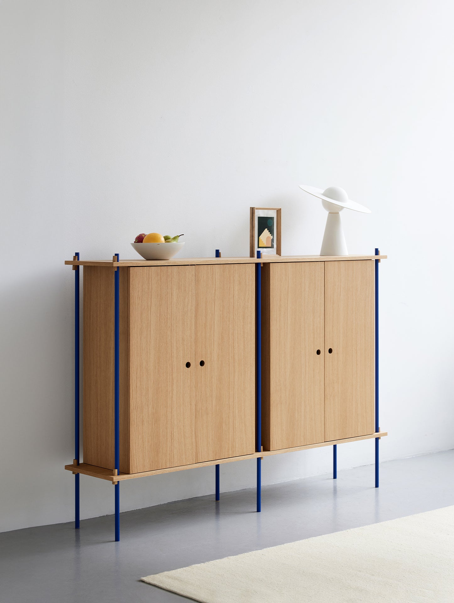 Moebe Shelving System - S.115.2.E Set in Deep Blue / Oiled Oak