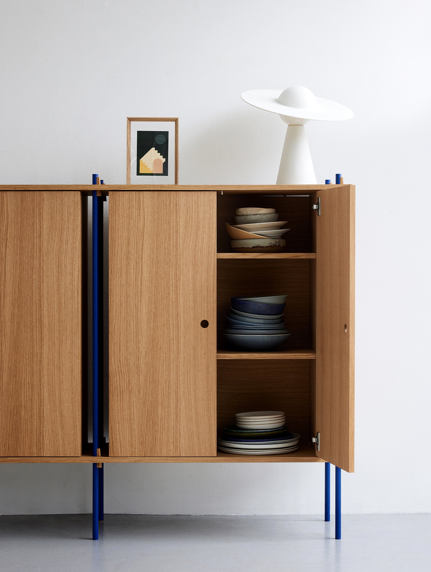 Moebe Shelving System - S.115.2.E Set in Deep Blue / Oiled Oak