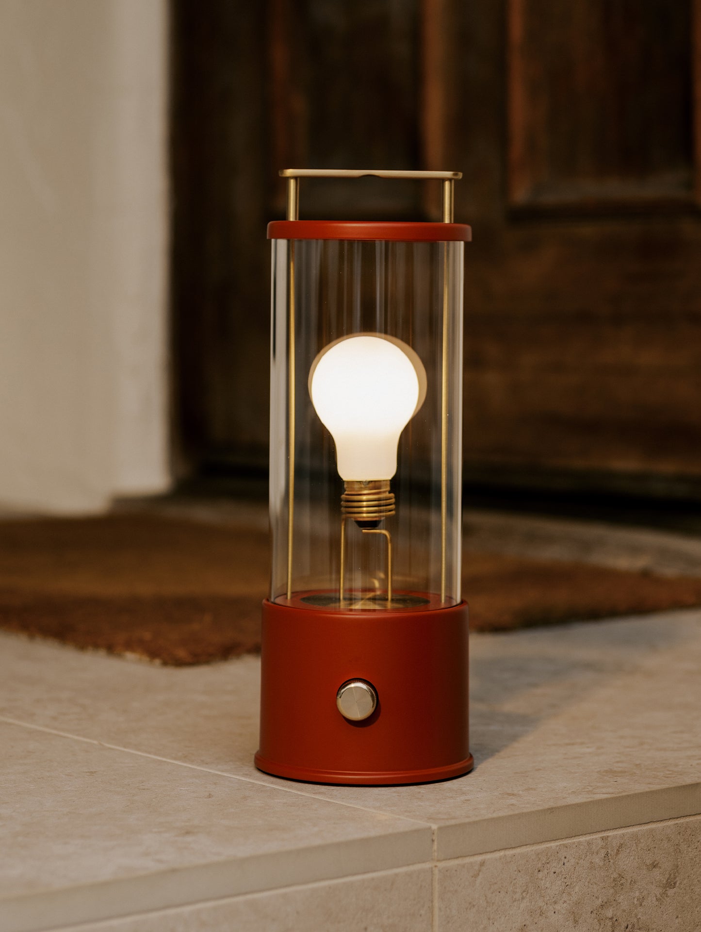 The Muse Portable Lamp in Pomona Red by Tala