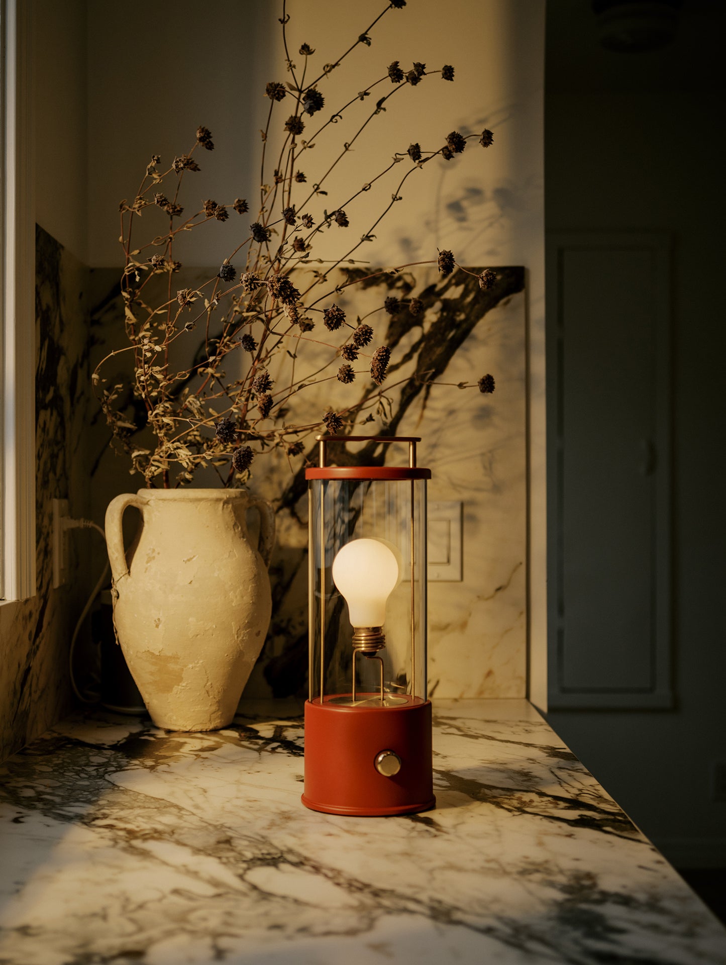 The Muse Portable Lamp in Pomona Red by Tala