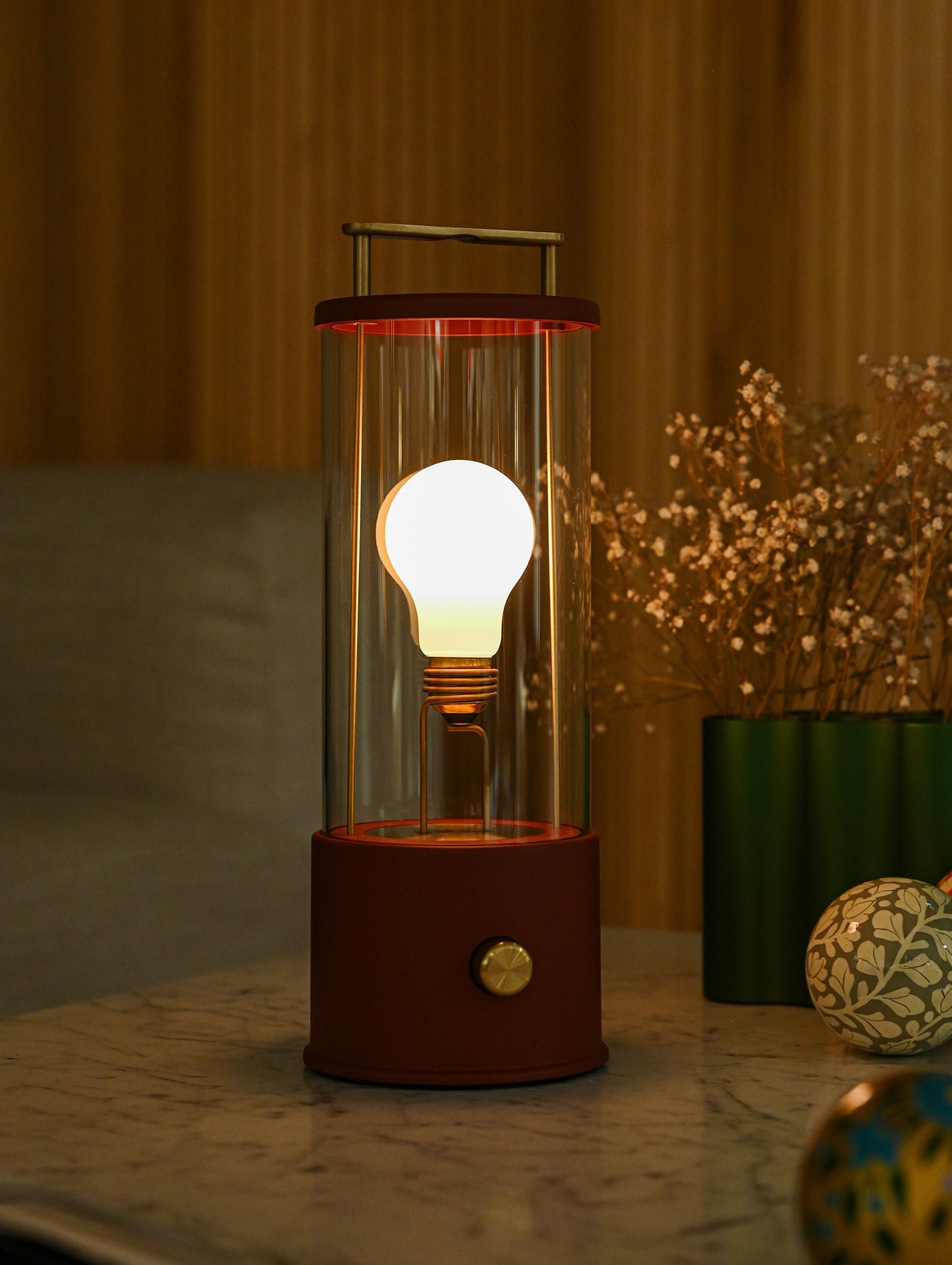 The Muse Portable Lamp in Pomona Red by Tala