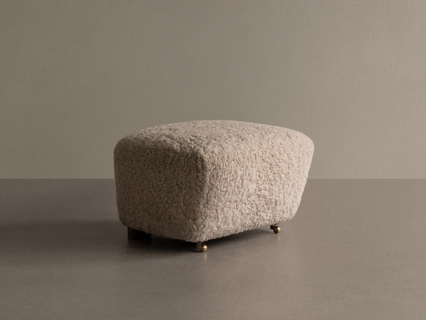 The Tired Man Ottoman by Audo Copenhagen - Dark Stained Oak Base / Sheepskin Moonlight