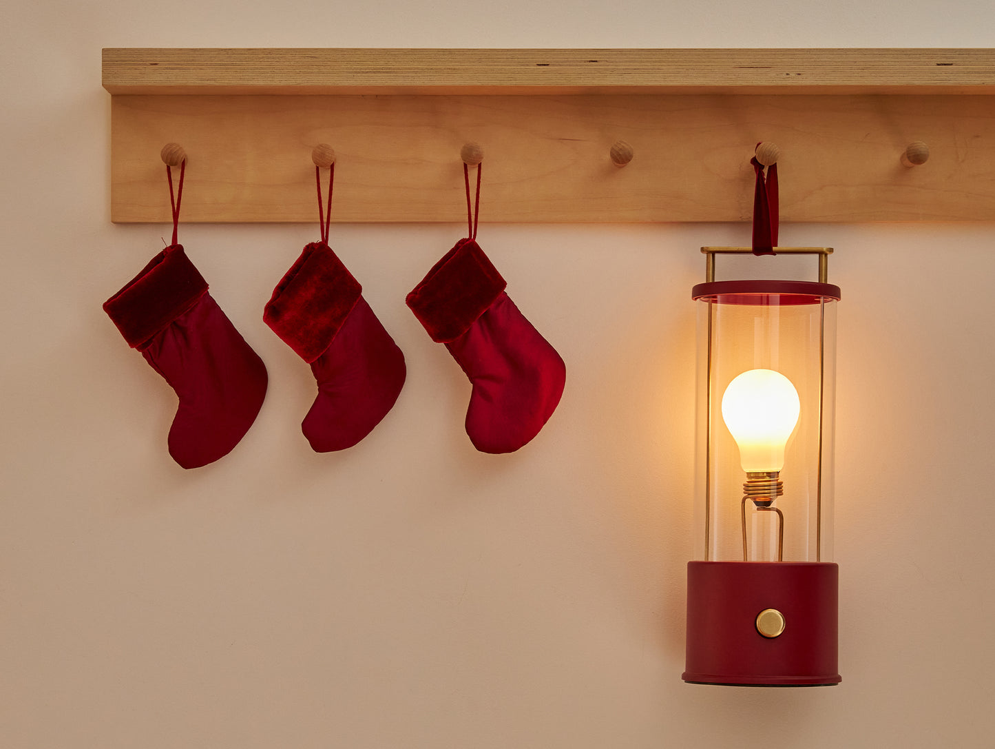The Muse Portable Lamp in Pomona Red by Tala
