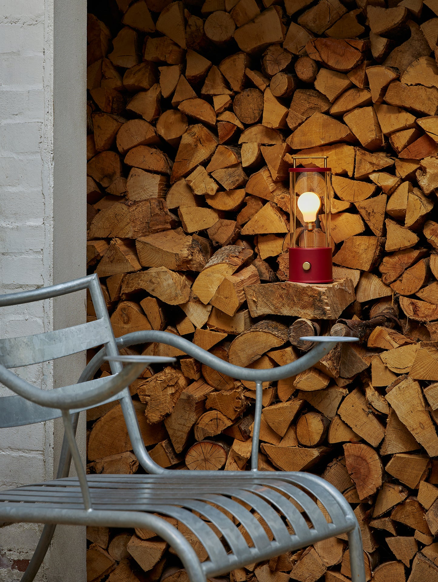 The Muse Portable Lamp in Pomona Red by Tala