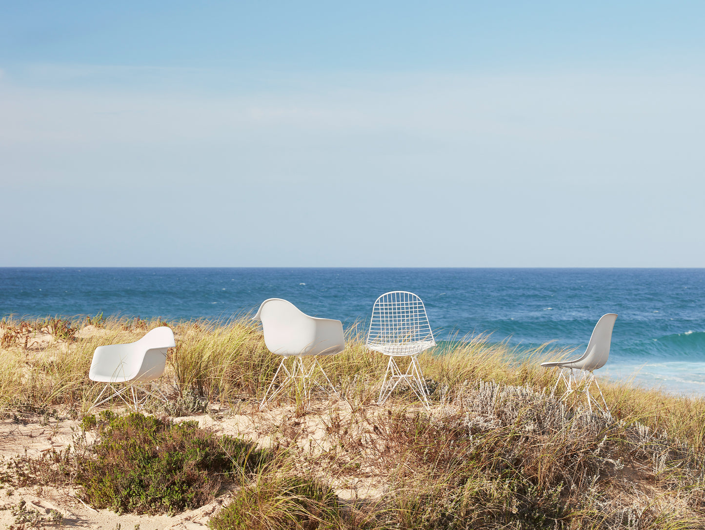 Eames Plastic Armchair LAR by Vitra - White 04 Shell / White Powder-Coated Steel Base