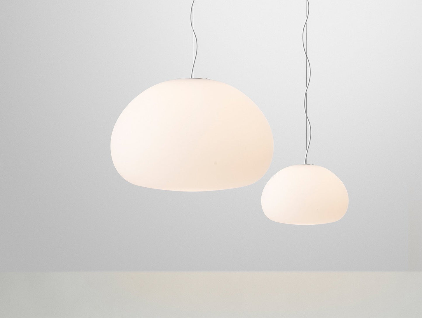 Fluid Glass Pendant Lights by Muuto