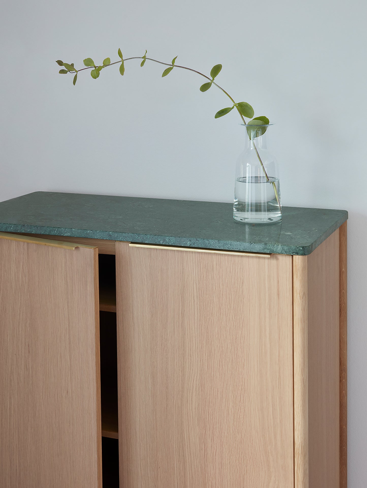 Jut High Cabinet in Green Verde Guatemala Marble by Skagerak