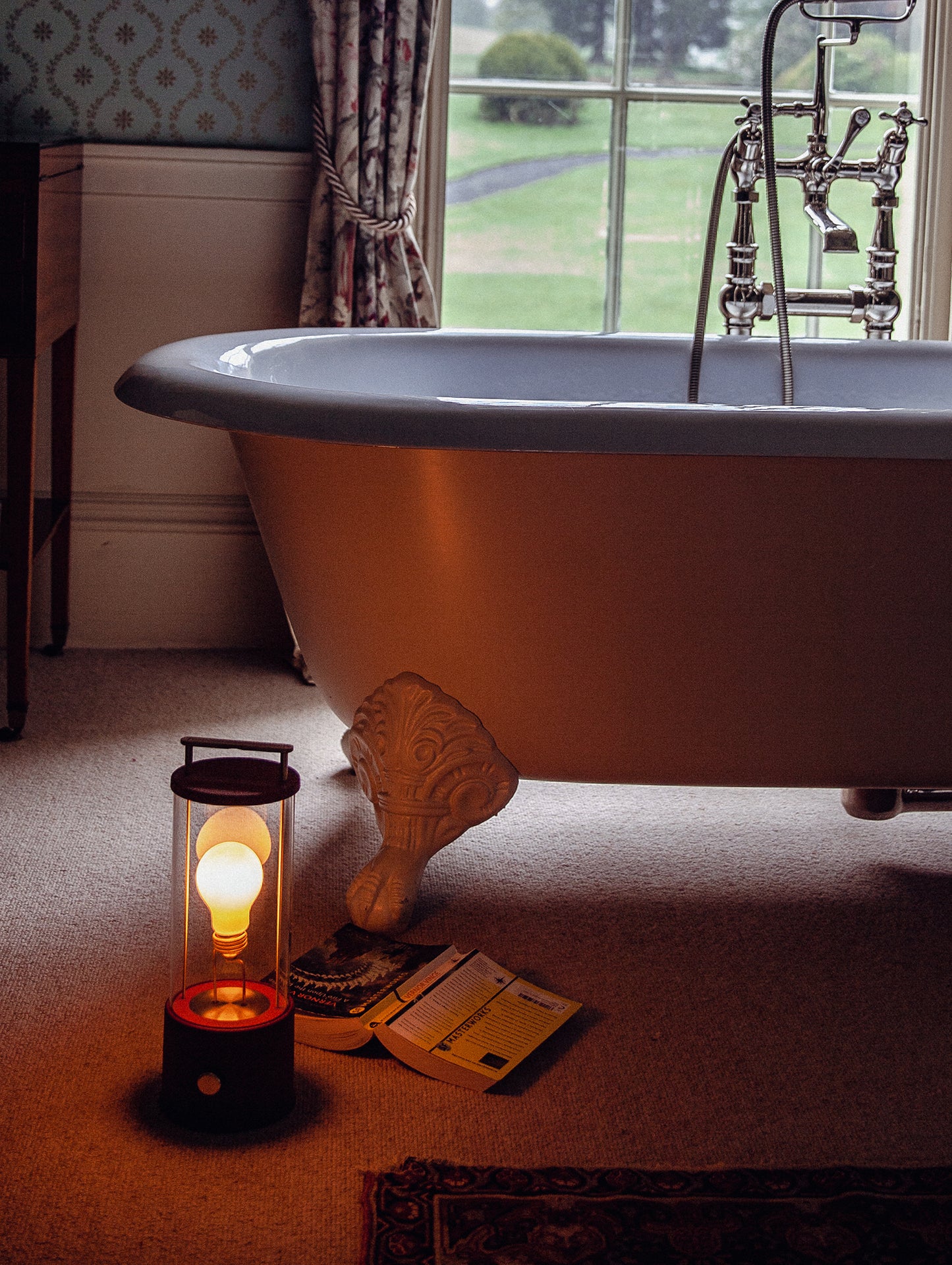 The Muse Portable Lamp in Pomona Red by Tala