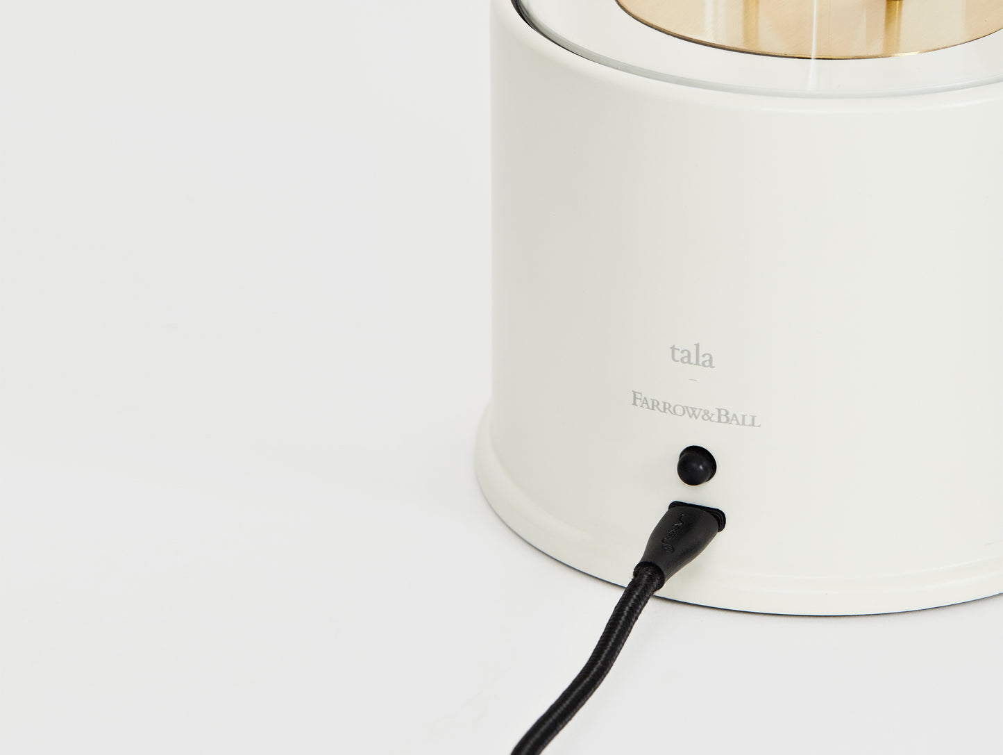 The Muse Portable Lamp in Candlenut White by Tala
