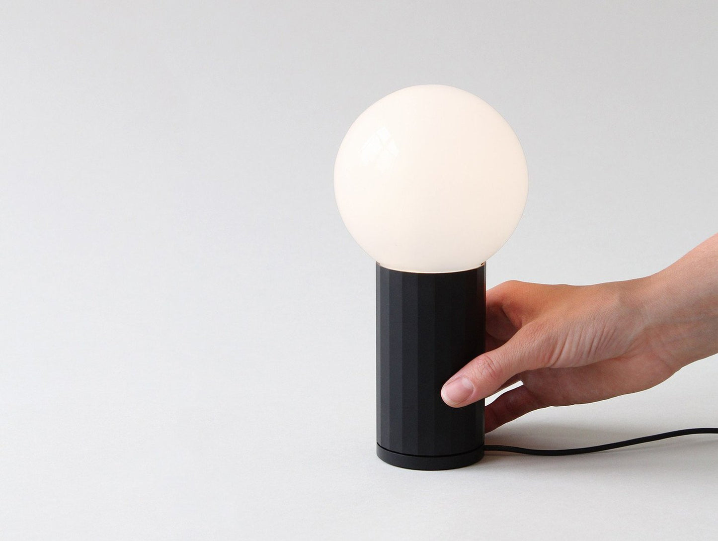 Black Turn On Lamp by HAY