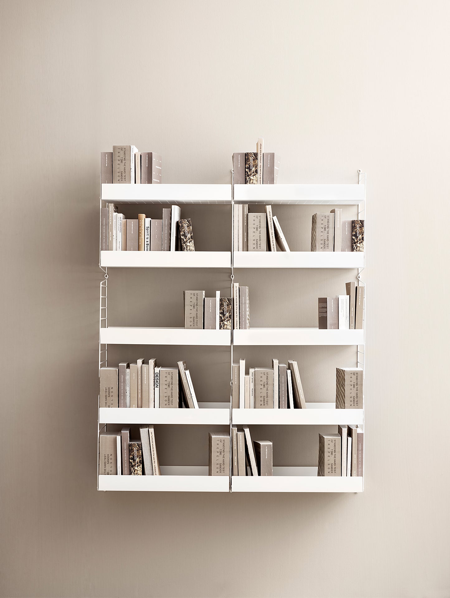 String White Metal Shelves in a library arrangement