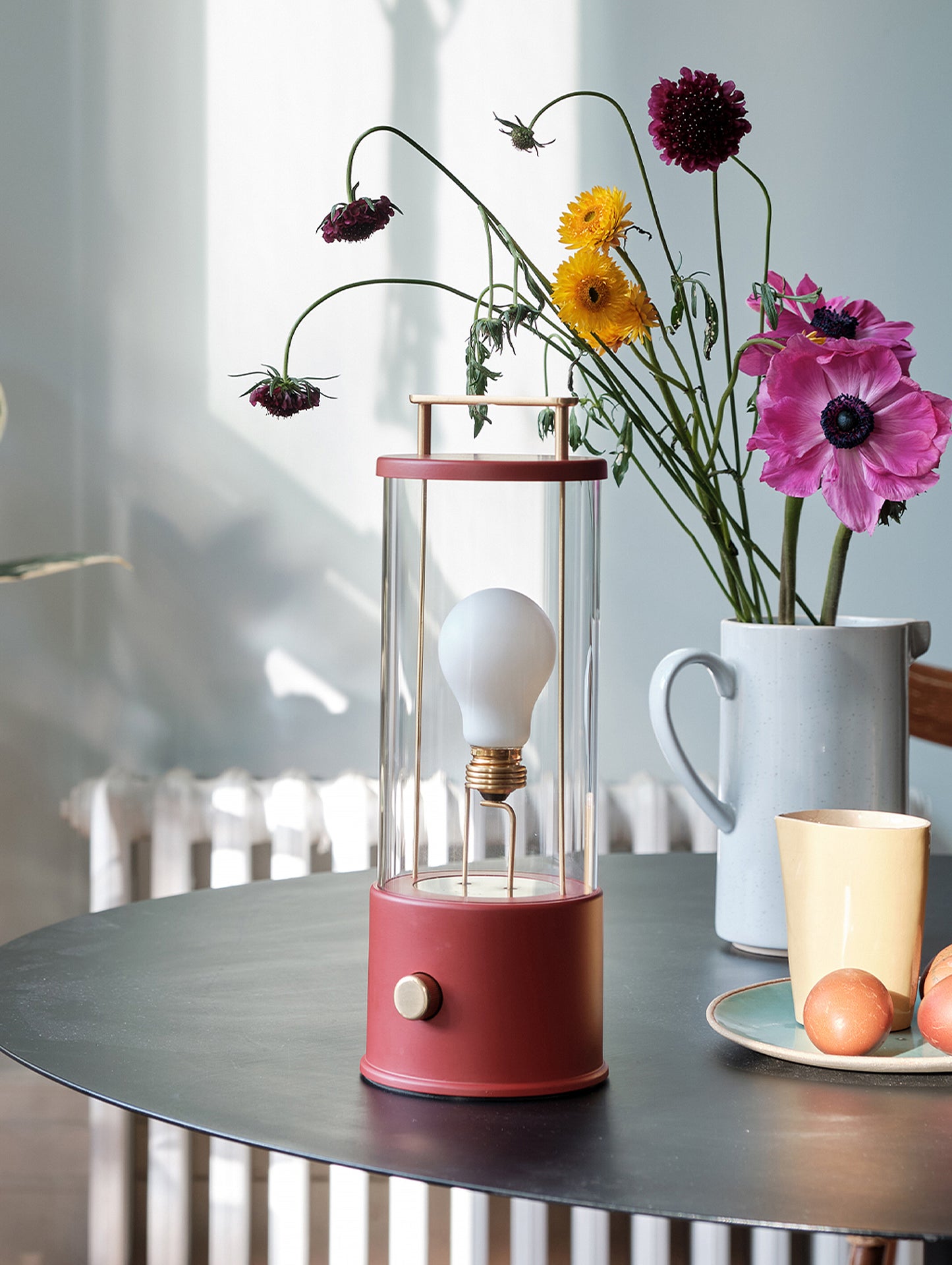 The Muse Portable Lamp in Pomona Red by Tala