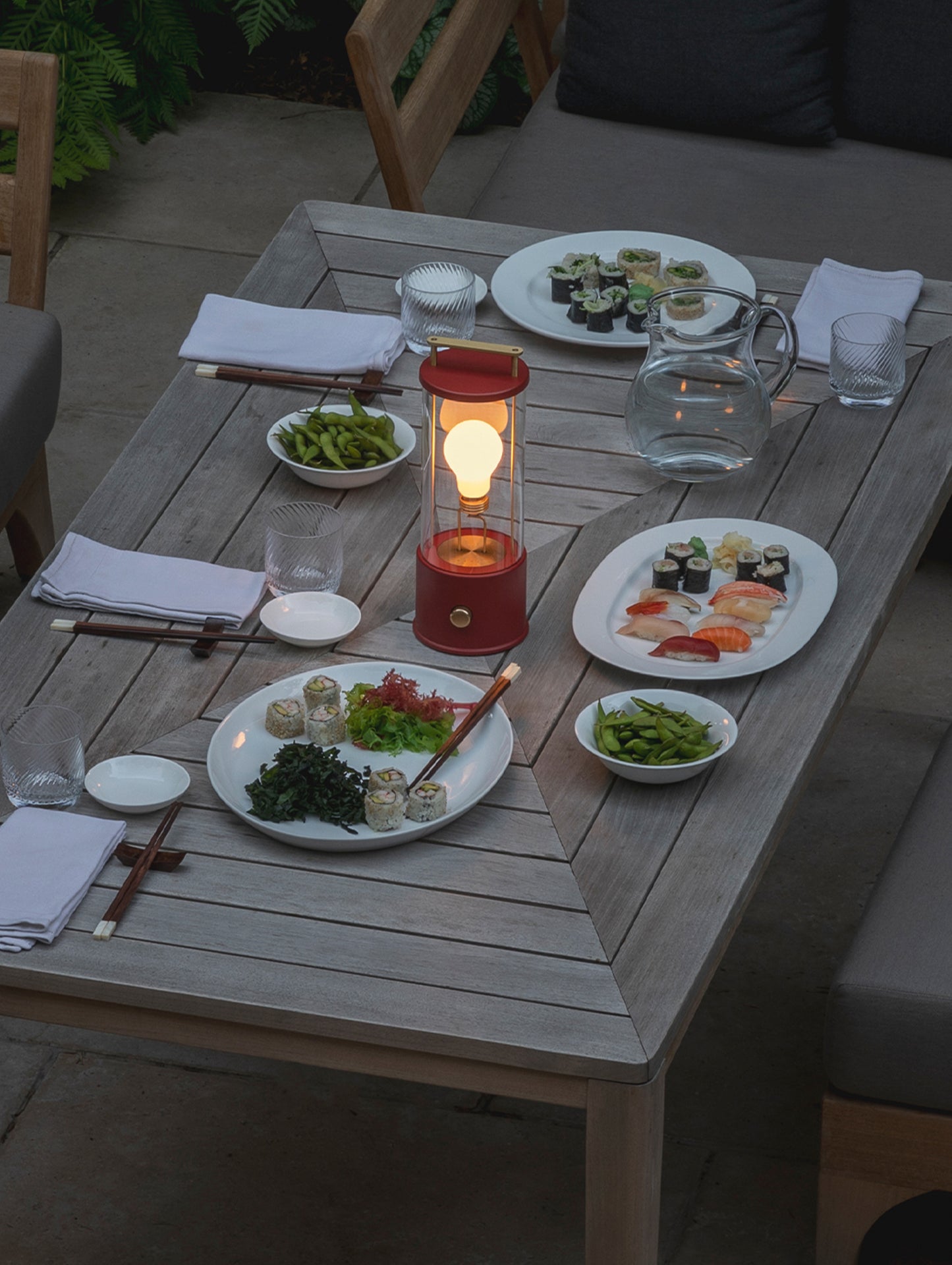 The Muse Portable Lamp in Pomona Red by Tala