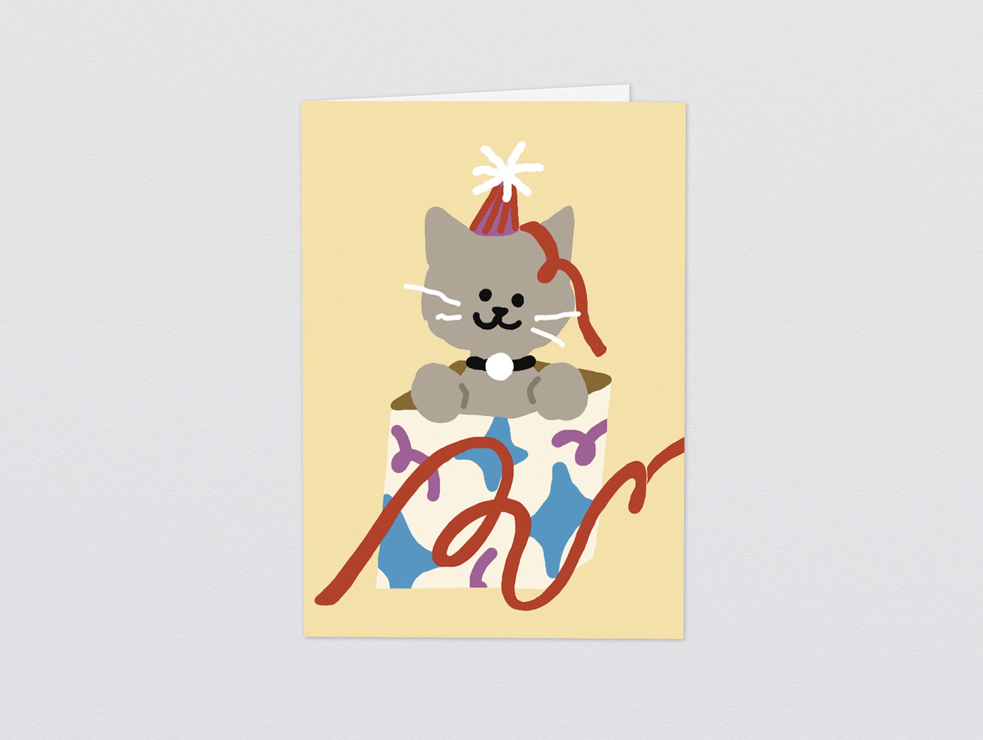 'Cat In A Present' Greetings Card by Wrap
