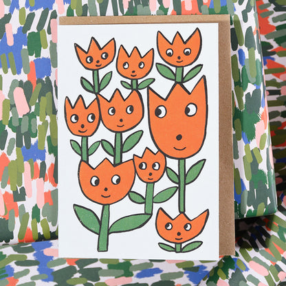 'Smiling Flowers' Embossed Greetings Card by Wrap