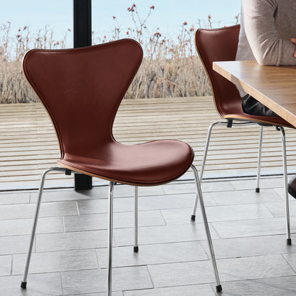 Series 7™ 3107 Dining Chair (Front Upholstered) by Fritz Hansen = Anniversary Edition / Front: Grace Chestnut Leather / Back: Clear Lacquered Walnut Veneer