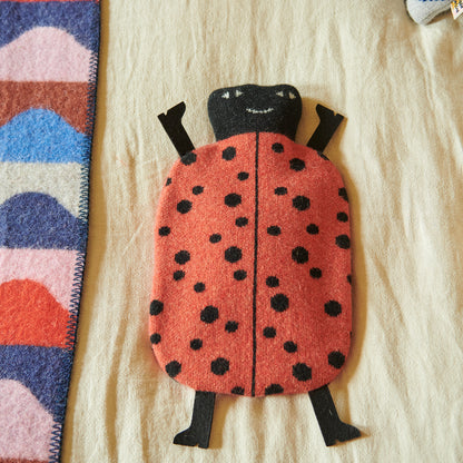 Ladybird Hot Water Bottle by Donna Wilson