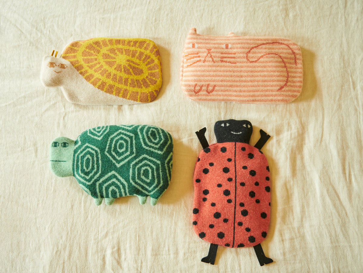 Ladybird Hot Water Bottle by Donna Wilson