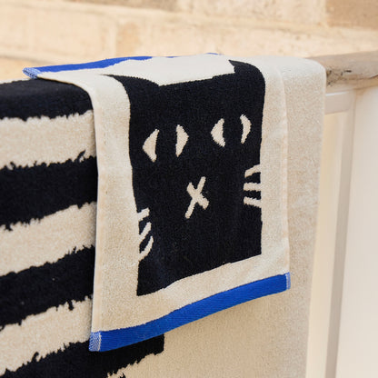 Lazy Cat Face Towel by Donna Wilson