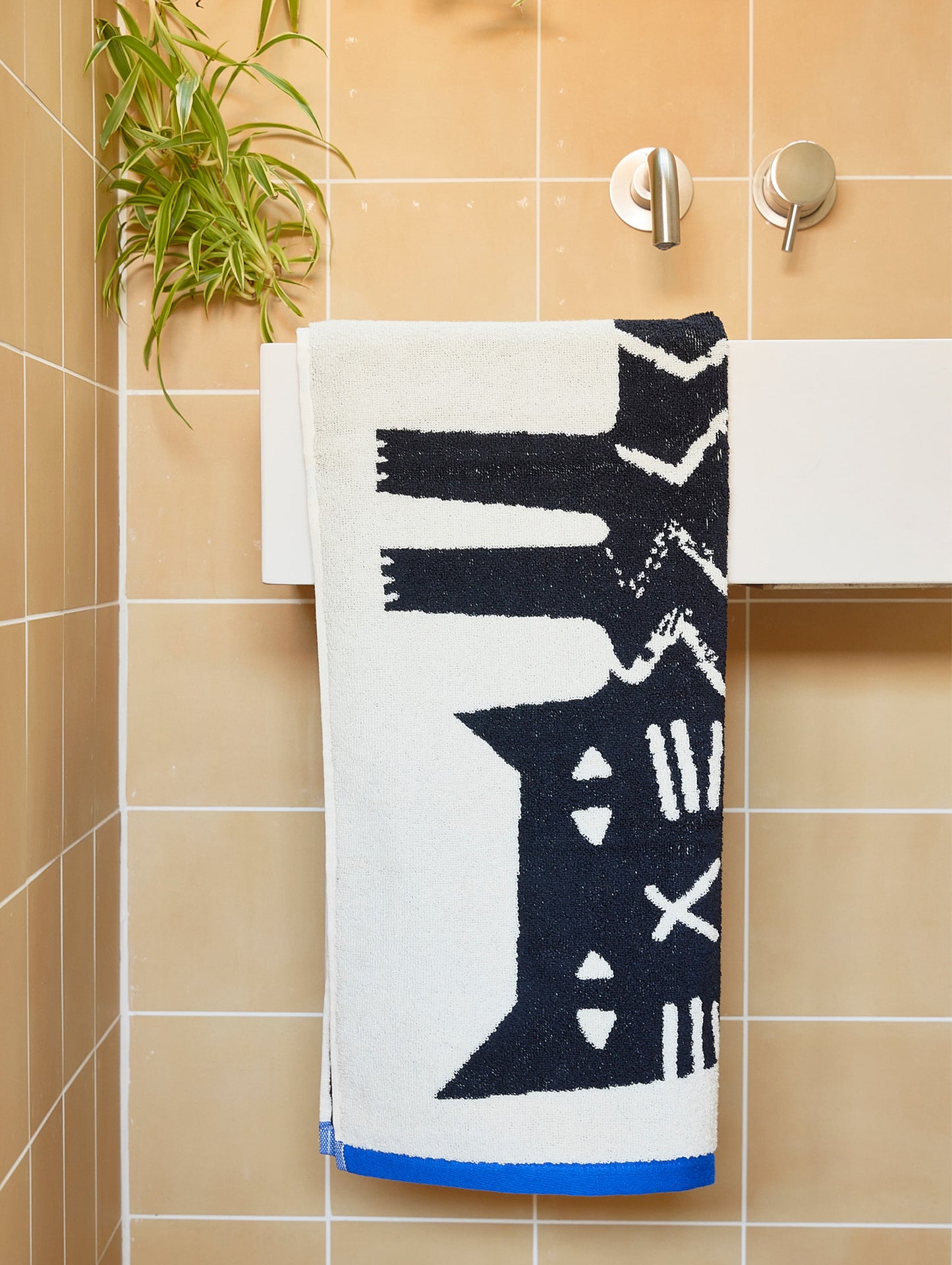 Lazy Cat Towels by Donna Wilson