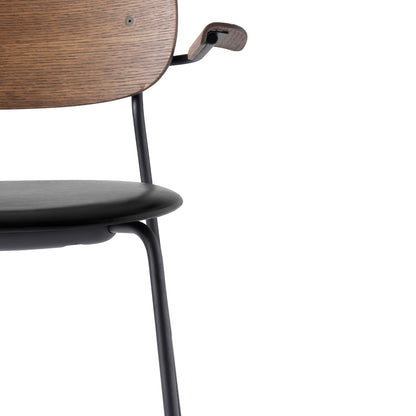Co Dining Chair Upholstered by Menu - With Armrest / Black Powder Coated Steel / Dark Oak / Black Dakar Leather