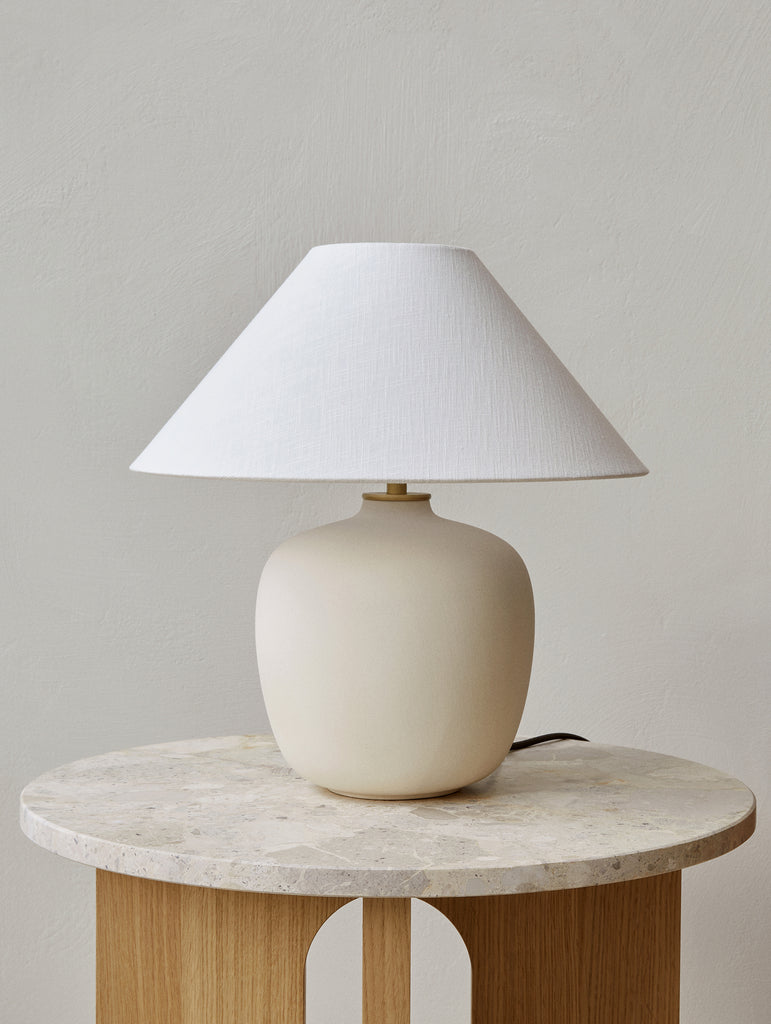 Corner table outlet with lamp