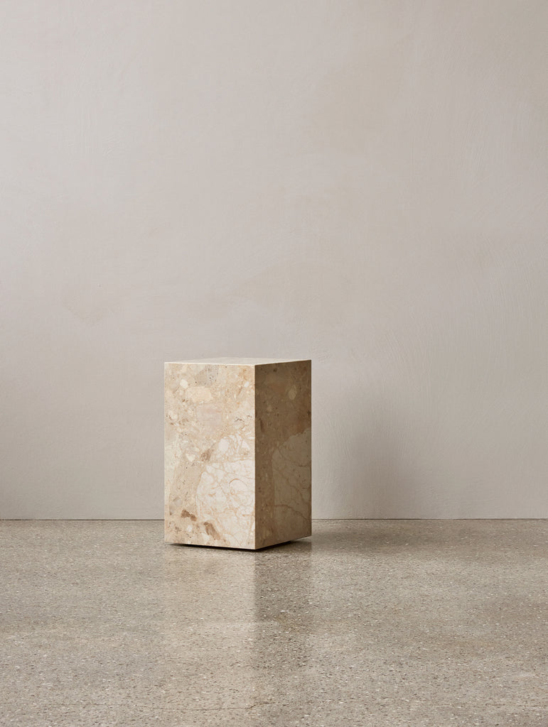 Stone plinth coffee store table