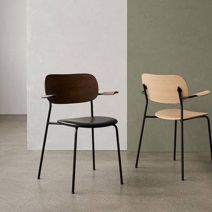 Co Dining Chair Upholstered by Menu - With Armrest / Black Powder Coated Steel / Dark Oak / Dakar Black Leather 